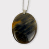 Pendentif pierre plate ovale pierre de lune noire