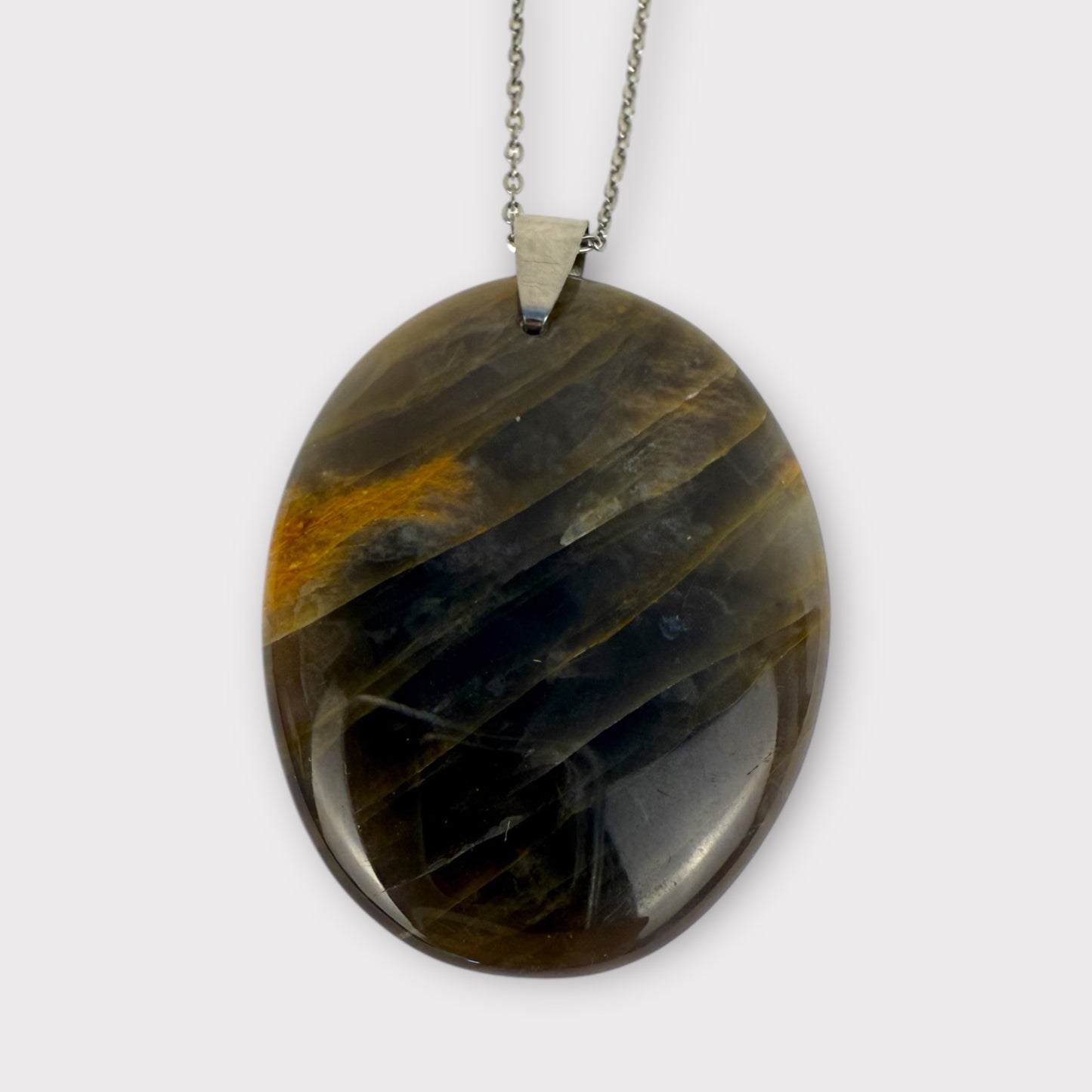 Pendentif pierre plate ovale pierre de lune noire